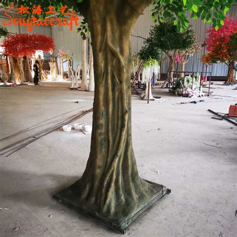 artificial tree trunk with branch.